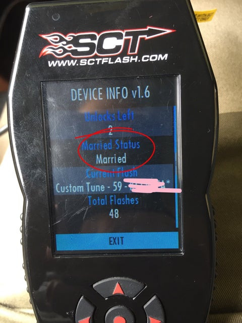 Checking device settings on an SCT X4 to verify unmarried status, ensuring it's ready for a new vehicle or resale