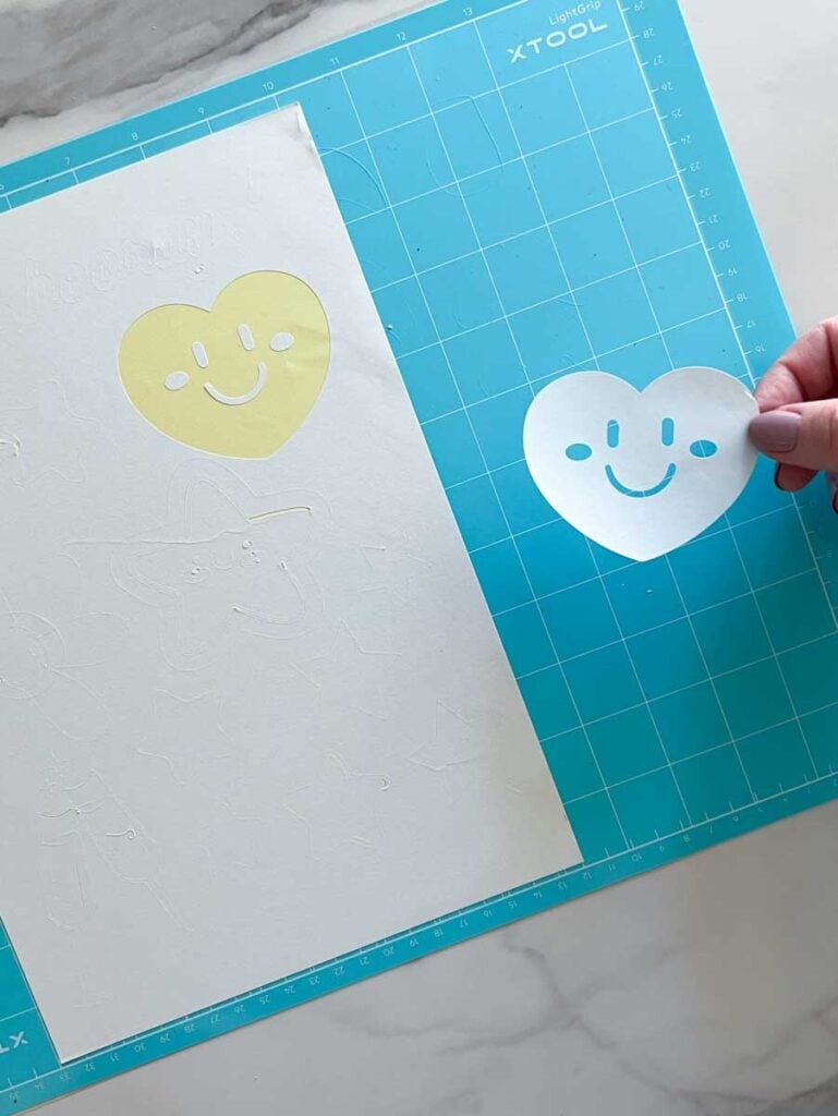 Smiley face heart stickers cut by the M1.